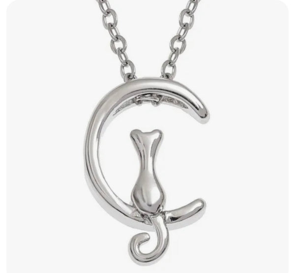 Silver Cat Sitting On A Crescent Moon Necklace
